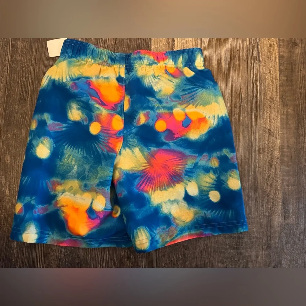 NEW‎ Under Armour Boys Size 5 Blue Tropical Swim Trunks Mesh Lined Shorts
